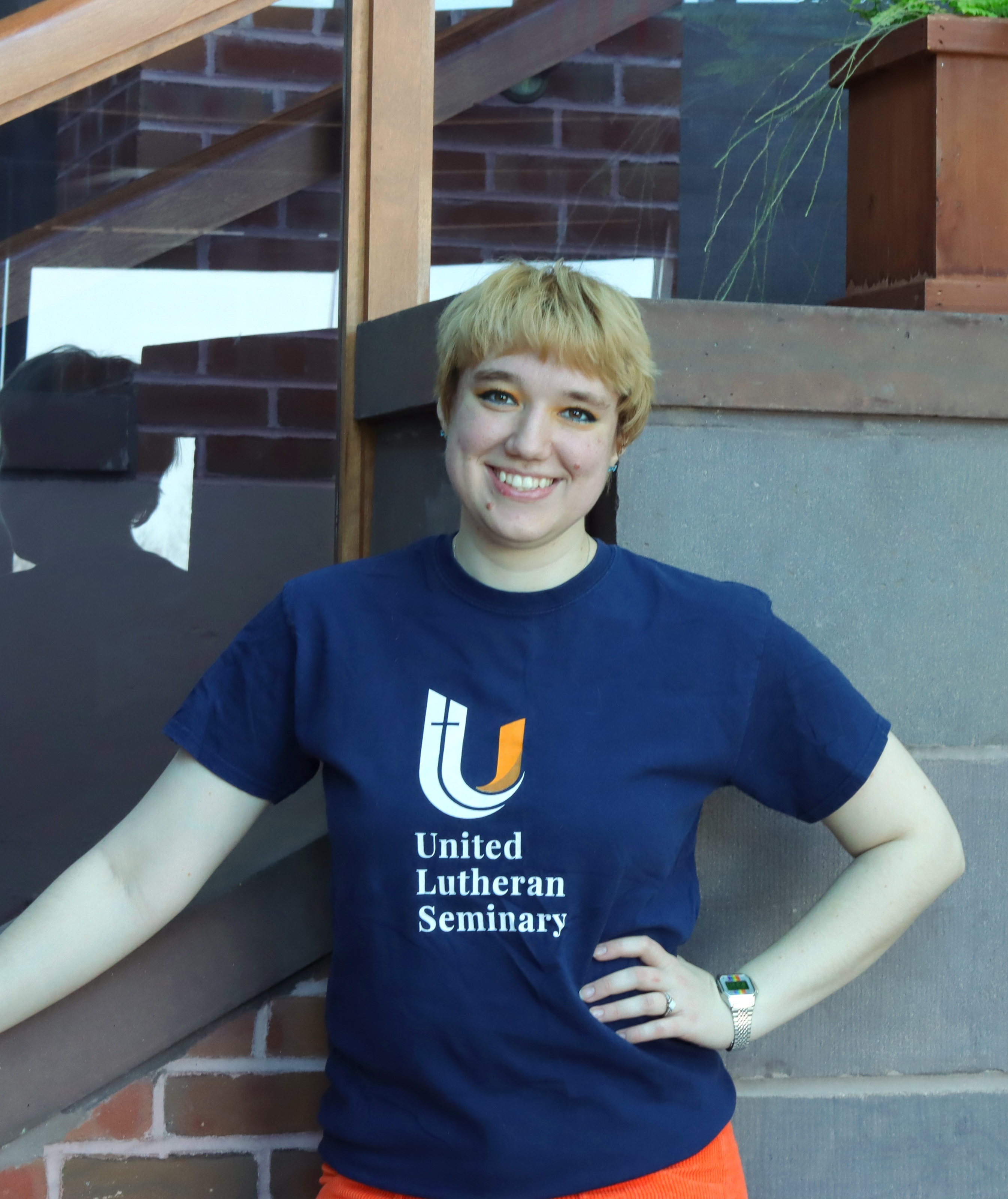 Victoria Jesswein in ULS shirt poses in Valentine Hall.